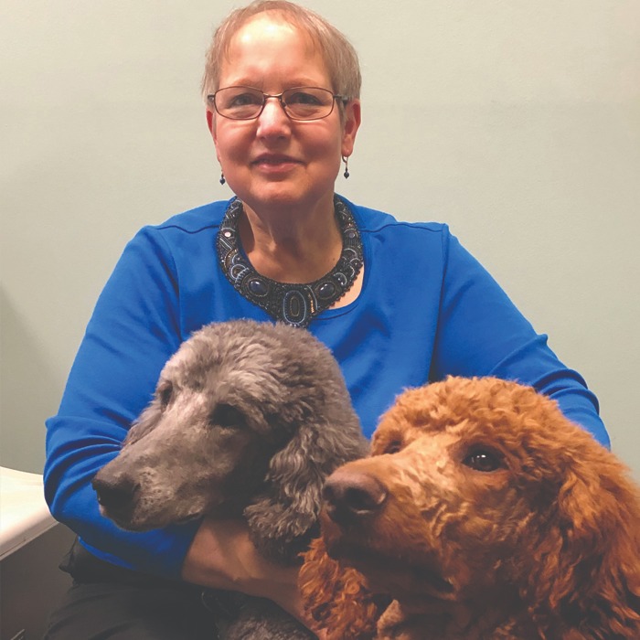 Dr. Irene Parent with office mascots.